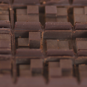 A closeup of chocolate bar graphs representing laughter.